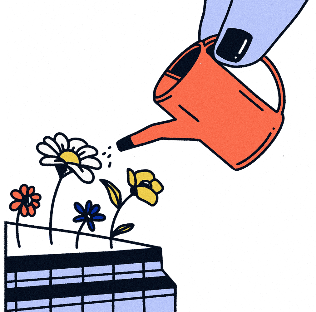 colour watering can and flowers